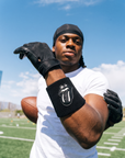 Player wearing the Black & Black RS Wristband on the field