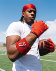 Player wearing the Red on Red RS Wristband on the field