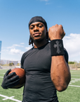 Player wearing the Black & Black Cross Wristband on the field