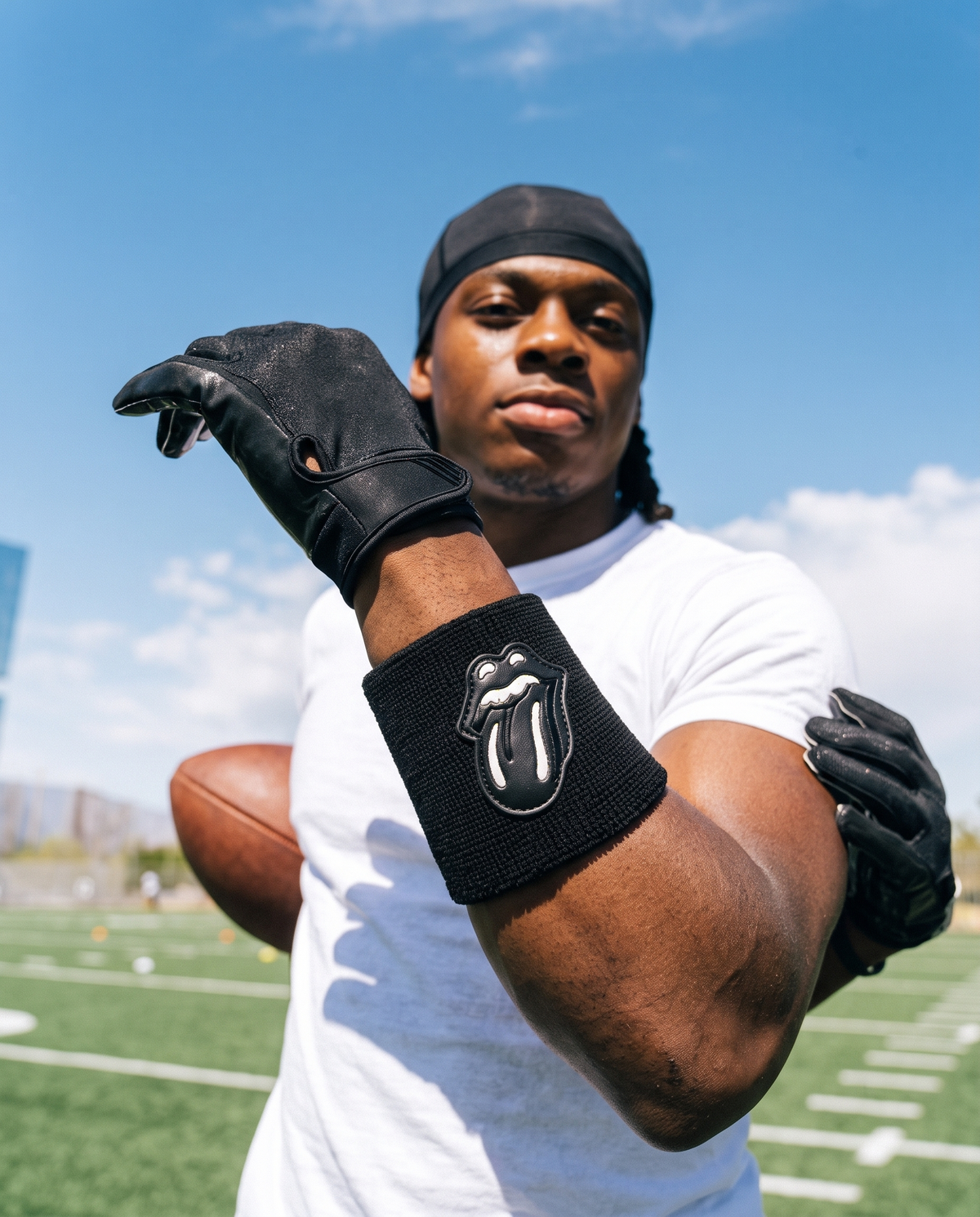 Player wearing the Black &amp; Black RS Wristband on the field