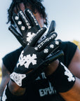 Model wearing the Black & White TriCross Wristband